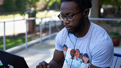 a man works on a computer